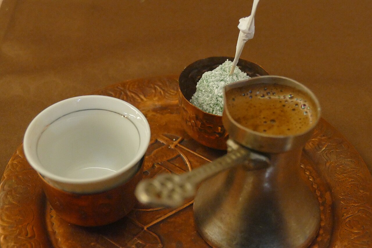 Traditional Bosnian coffee with lokum and woodruff served in a classic setup